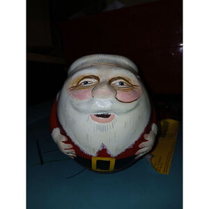 This Vintage Roly Poly Santa figurine is a unique addition to any Christmas Deco